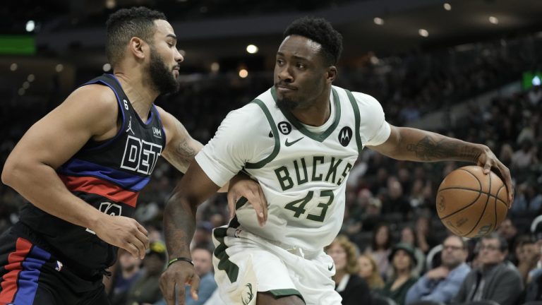 Milwaukee Bucks' Thanasis Antetokounmpo tries to get past Detroit Pistons' Cory Joseph during the second half of an NBA basketball game Wednesday, Nov. 2, 2022, in Milwaukee. The Bucks won 116-91. (Morry Gash/AP)