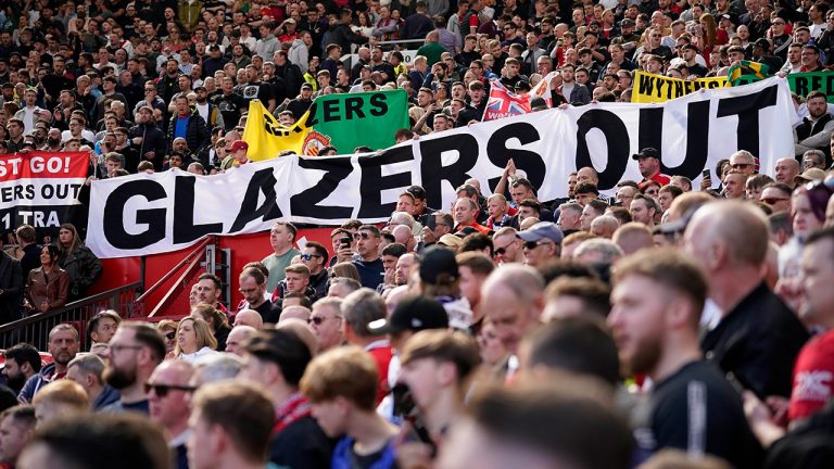 A banner writing ' Glazers out' is displayed by spectators during the English Premier League soccer match between Manchester United and Everton, at the Old Trafford stadium in Manchester, England, Saturday, April 8, 2023. (Dave Thompson/AP)