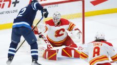 Flames keep playoff hopes within reach after heroic showing from Markstrom