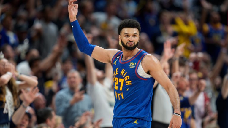 Denver Nuggets guard Jamal Murray gestures to the crowd after hitting a basket against the Phoenix Suns in the second half of Game 1 of an NBA second-round basketball series Saturday, April 29, 2023, in Denver. (David Zalubowski/AP)