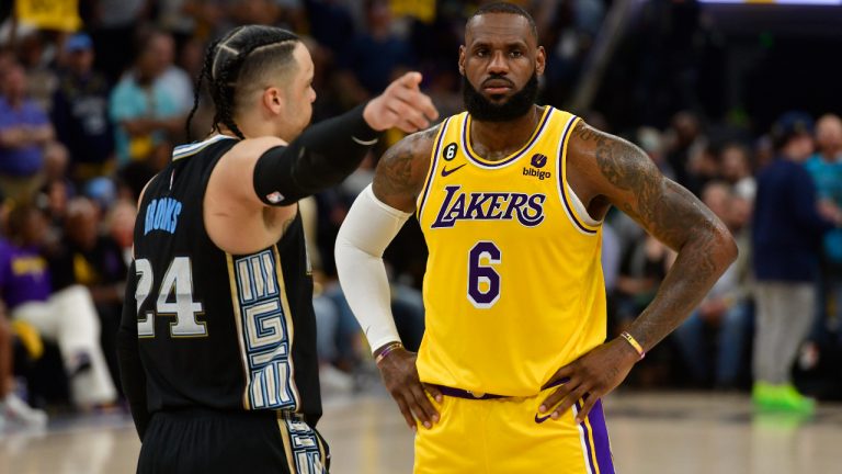 Memphis Grizzlies forward Dillon Brooks (24) talks to Los Angeles Lakers forward LeBron James (6) during the second half of Game 2 in a first-round NBA basketball playoff series Wednesday, April 19, 2023, in Memphis, Tenn. (Brandon Dill/AP)