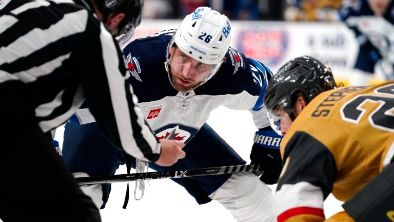 Winnipeg Jets right wing Blake Wheeler (26) and Vegas Golden Knights centre Chandler Stephenson (20) wait for a faceoff during the first period of Game 2 of an NHL hockey Stanley Cup first-round playoff series. (Lucas Peltier/AP)