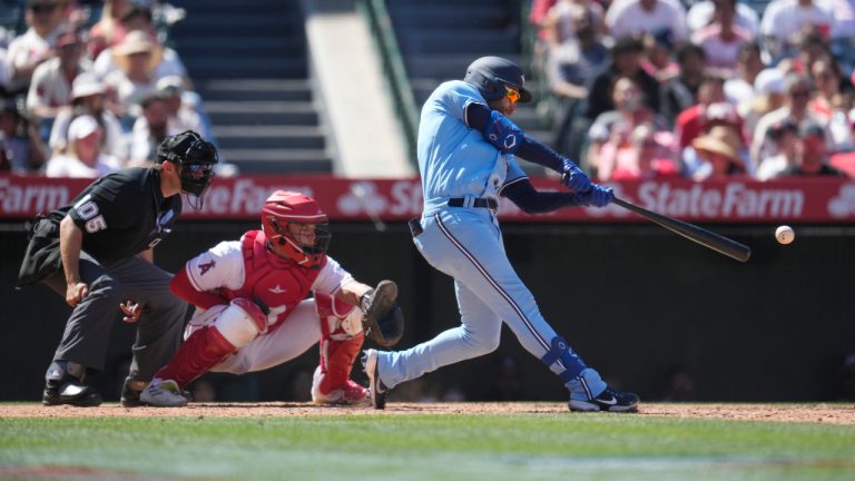 Toronto Blue Jays' Kevin Kiermaier drives in two-runs with a triple during the sixth inning of a baseball game against the Los Angeles Angels Sunday, April 9, 2023, in Anaheim, Calif. (Marcio Jose Sanchez/AP)