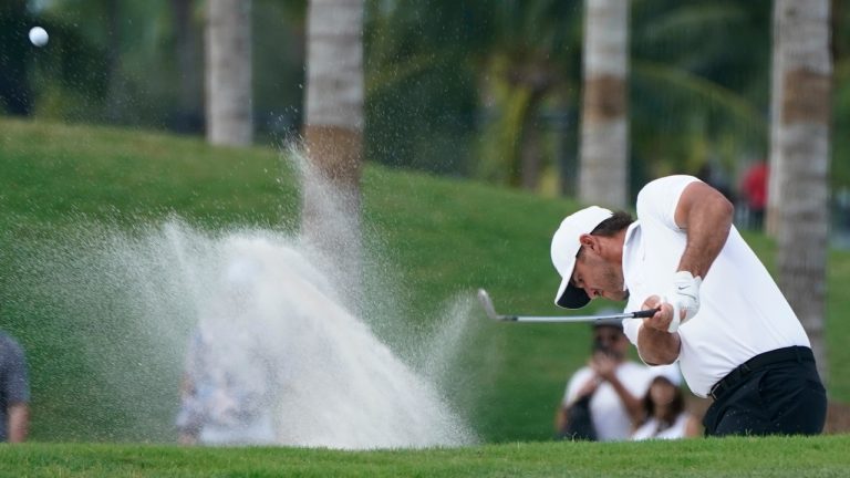 Brooks Koepka hits from a bunker on the 17th fairway during the final round of the LIV Golf Team Championship at Trump National Doral Golf Club, Sunday, Oct. 30, 2022, in Doral, Fla. (Lynne Sladky/AP)