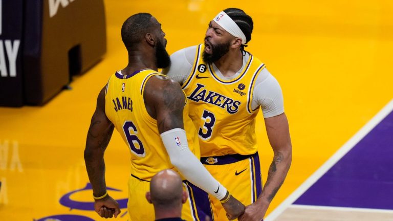 Los Angeles Lakers' LeBron James and Anthony Davis celebrate a basket by James in overtime in Game 4 of a first-round NBA basketball playoff series against the Memphis Grizzlies Monday, April 24, 2023, in Los Angeles. The Lakers won 117-111. (Jae C. Hong/AP Photo)