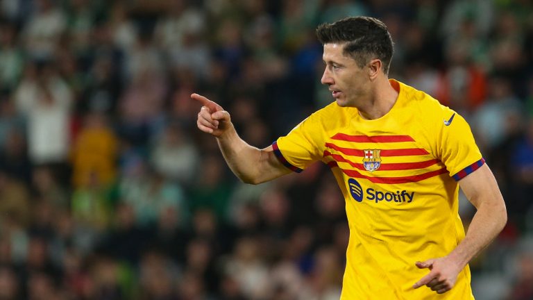 Barcelona's Robert Lewandowski celebrates after scoring his side's third goal during a Spanish La Liga soccer match between Elche and Barcelona, at the Martinez Valero Stadium in Elche, Spain, Saturday, April 1, 2023. (Alberto Saiz/AP)