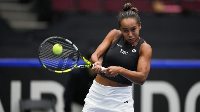 Canada's Leylah Fernandez returns to Belgium's Yanina Wickmayer during a Billie Jean King Cup qualifiers singles match, in Vancouver, on Friday, April 14, 2023. (Darryl Dyck/CP)