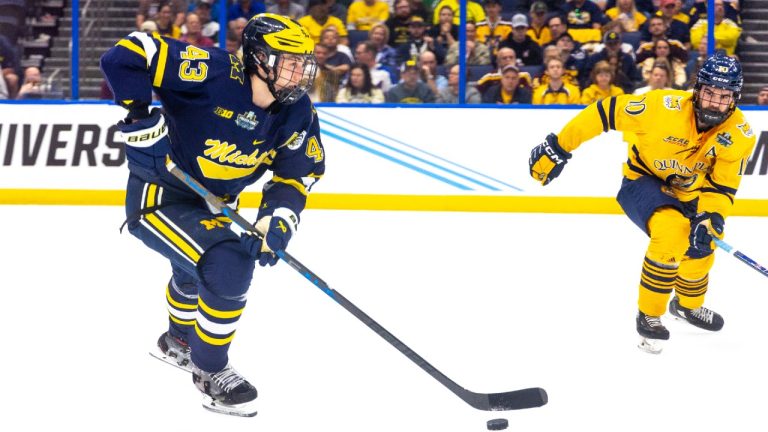 Michigan defenceman Luke Hughes carries the puck up during a Frozen Four semifinal game against Quinnipiac at Amalie Arena, in Tampa Fla., on Thursday, April 7, 2023. (Paul Barnick/Sportsnet)