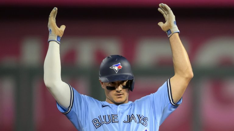 Toronto Blue Jays' Matt Chapman celebrates after hitting a double against the Kansas City Royals during the eighth inning of a baseball game, Tuesday, April 4, 2023, in Kansas City, Mo. (Reed Hoffmann/AP)