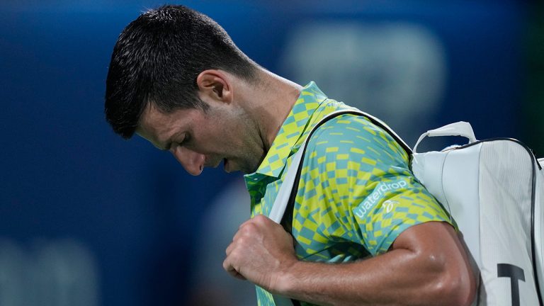 Serbia's Novak Djokovic reacts after he lost a semifinal match against Daniil Medvedev at the Dubai Duty Free Tennis Championships in Dubai, United Arab Emirates, Friday, March 2, 2023. (AP)