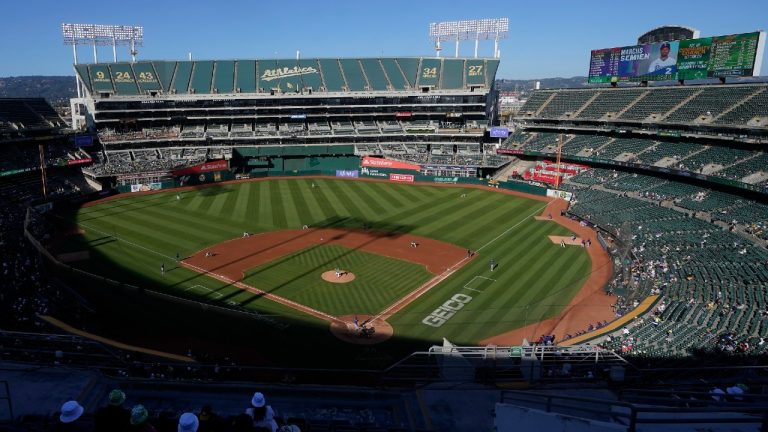 People watch a baseball game at Oakland Coliseum between the Oakland Athletics and the Texas Rangers in Oakland, Calif., July 23, 2022. (Jeff Chiu/AP)