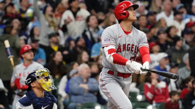 Los Angeles Angels' DH Shohei Ohtani watches his solo home run during the third inning of a game against the Milwaukee Brewers, in April 2023. (Photo by Aaron Gash/AP)