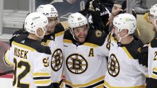 Bruins break NHL single-season win record with 63rd victory