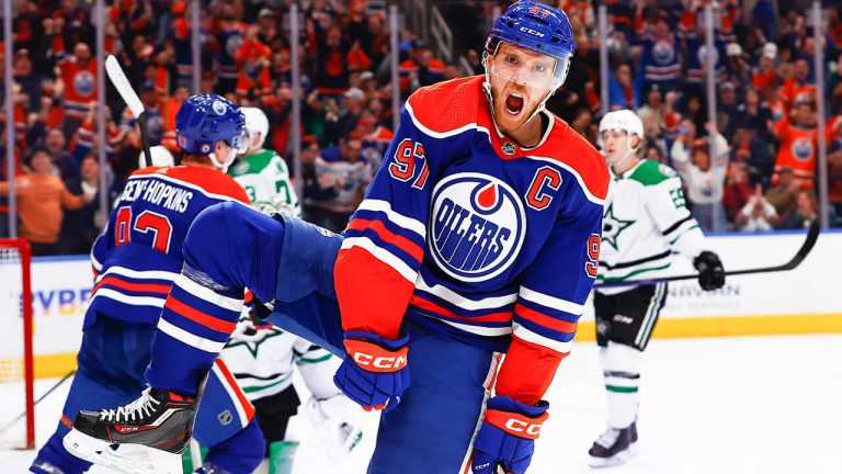 Edmonton Oilers Center Connor McDavid (97) celebrates his goal and 131st point in the third period of the Edmonton Oilers game versus the Dallas Stars on March 16, 2023 at Rogers Place in Edmonton, AB. (Photo by Curtis Comeau/Icon Sportswire via Getty Images)