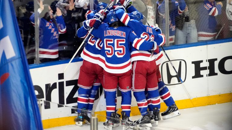 The New York Rangers celebrate after center Mika Zibanejad scored a goal against the New Jersey Devils during the second period of an NHL hockey game, Saturday, April 29, 2023, at Madison Square Garden in New York. (Mary Altaffer/AP)