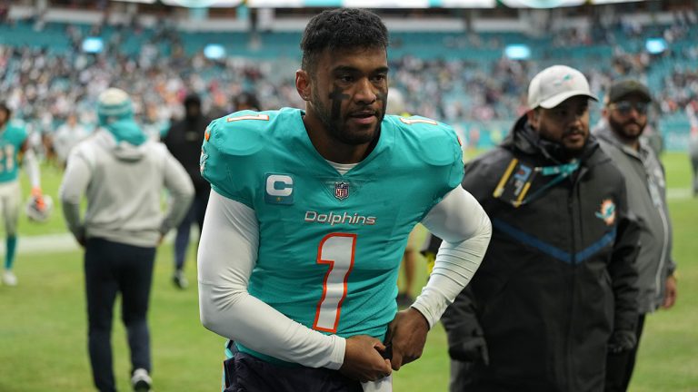 Miami Dolphins quarterback Tua Tagovailoa  walks off the field after an NFL football game against the Green Bay Packers, Sunday, Dec. 25, 2022, in Miami Gardens, Fla. Tagovailoa has officially been ruled out for Sunday's game at New England after suffering a concussion in Miami's Christmas Day loss to Green Bay.
(Jim Rassol/AP)