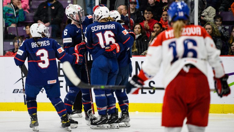 USA teammates celebrate after forward Abby Roque (11) scored on Czechia goaltender Blanka Skodova (31) during third period IIHF Women’s World Hockey Championship hockey action, in Brampton, Ont. on Sunday, April 9, 2023. (Christopher Katsarov/CP)