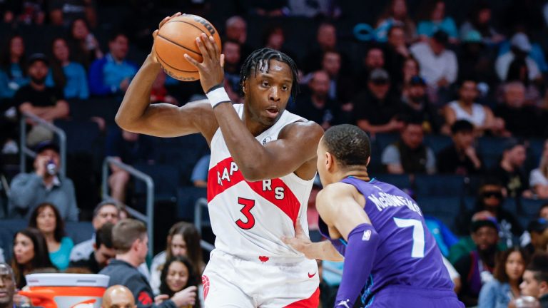 Toronto Raptors forward O.G. Anunoby (3) runs the offense against Charlotte Hornets guard Bryce McGowens (7) during the second half of an NBA basketball game in Charlotte, N.C., Sunday, April 2, 2023. Toronto won 128-108. (Nell Redmond/AP)