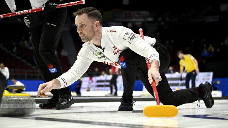 Canada skip Brad Gushue delivers a throw as they take on Germany at the Men's World Curling Championship in Ottawa, on Thursday, April 6, 2023. (Justin Tang/CP)