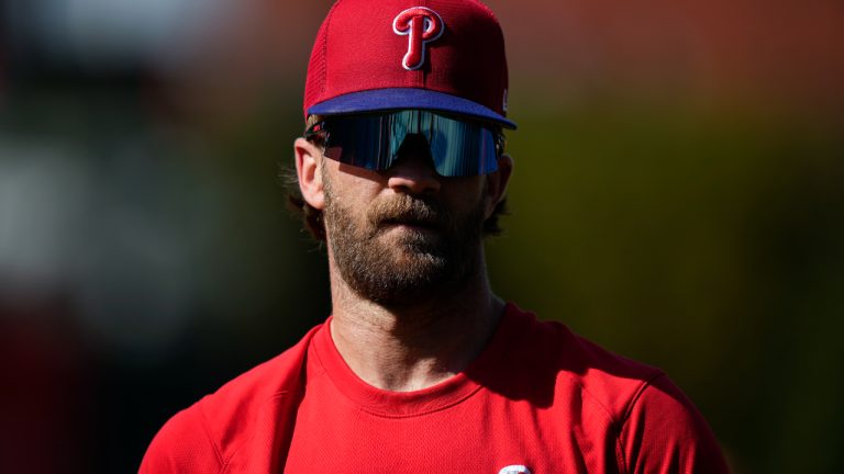 Philadelphia Phillies' Bryce Harper walks the field before a baseball game against the Colorado Rockies, Friday, April 21, 2023, in Philadelphia. (Matt Slocum/AP)