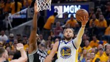 Curry, Warriors hold off Kings to even series at 2-2