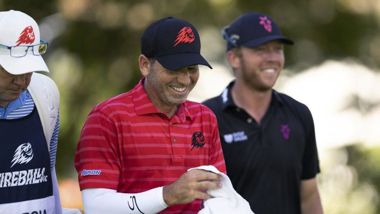 Sergio Garcia, center, and Talor Gooch smile on the fifth hole during the final round of LIV Golf Singapore at Sentosa Golf Club. (Doug DeFelice/AP)