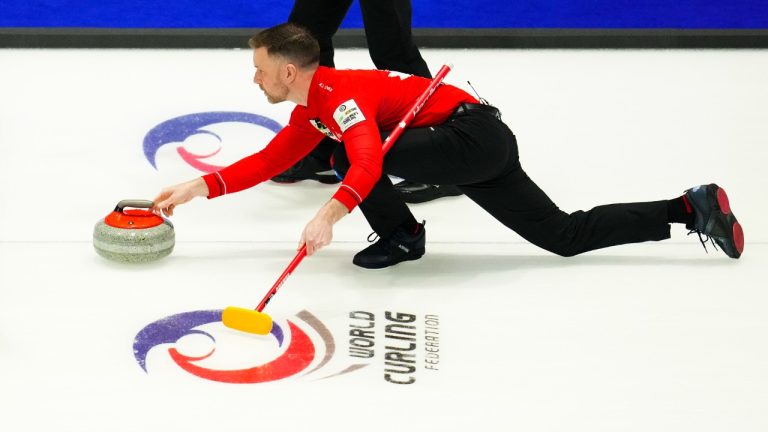 Canadian skip Brad Gushue delivers a stone while taking on Switzerland at the Men's World Curling Championship in Ottawa on Saturday, April 1, 2023. (Sean Kilpatrick/CP)