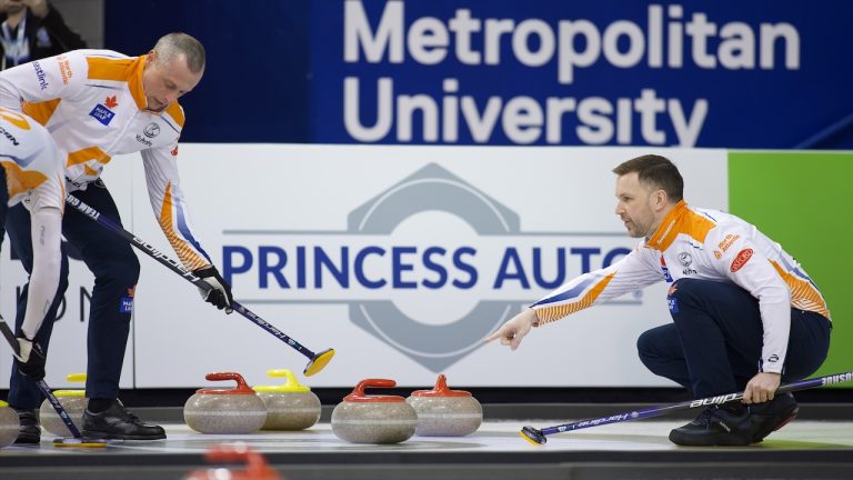 Skip Brad Gushue (right) directs his sweepers during the fifth draw of action at the Princess Auto Players' Championship on Wednesday, April 12, 2023, in Toronto. (Anil Mungal/GSOC)