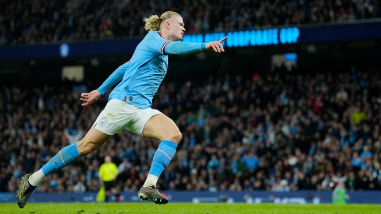 Manchester City's Erling Haaland celebrates after scoring his side's opening goal during the English FA Cup quarter final soccer match between Manchester City and Burnley at the Etihad stadium in Manchester, England, Saturday, March 18, 2023. (Jon Super/AP)