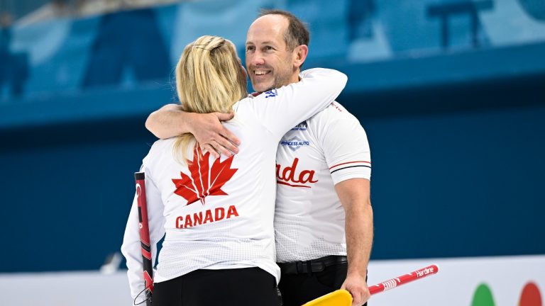 Canada’s Jennifer Jones and Brent Laing hug at the World Mixed Doubles Curling Championship Gangneung, Korea on Wednesday, April 26, 2023. The husband-and-wife duo qualified for the semifinal after wrapping up first place in their pool at the world mixed doubles curling championship on Thursday. (Eakin Howard/World Curling Federation)