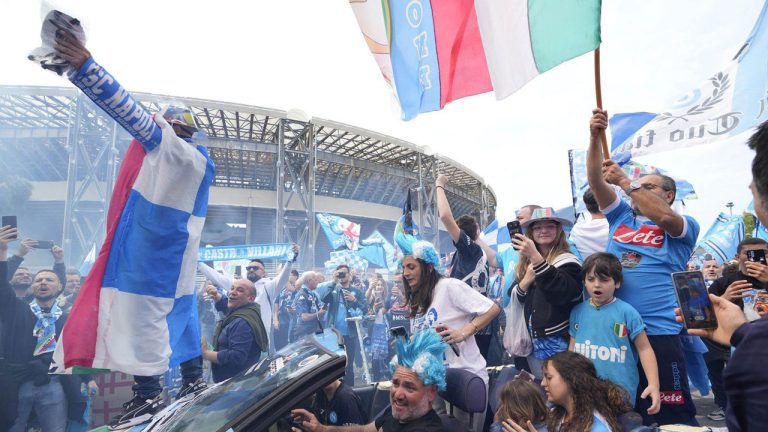 Napoli fans celebrate outside the Diego Maradona stadium in Naples. (Gregorio Borgia/AP)
