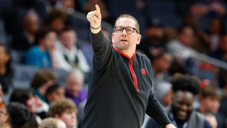 Toronto Raptors head coach Nick Nurse directs his team during the first half of an NBA basketball game against the Charlotte Hornets in Charlotte, N.C., Sunday, April 2, 2023. Toronto won 128-108. (Nell Redmond/AP Photo)