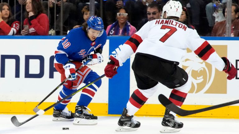 New York Rangers left wing Artemi Panarin (10) skates against New Jersey Devils defenseman Dougie Hamilton (7) during the first period of an NHL hockey game, Saturday, April 29, 2023, at Madison Square Garden in New York. (Mary Altaffer/AP)