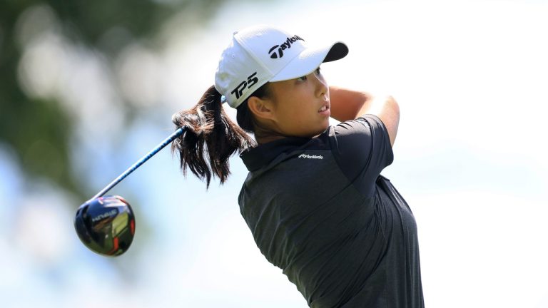 Ruoning Yin, of China, watches her shot from the 13th tee during the first round of the LPGA Tour Kroger Queen City Championship golf tournament in Cincinnati, Thursday, Sept. 8, 2022. (Aaron Doster/AP Photo)