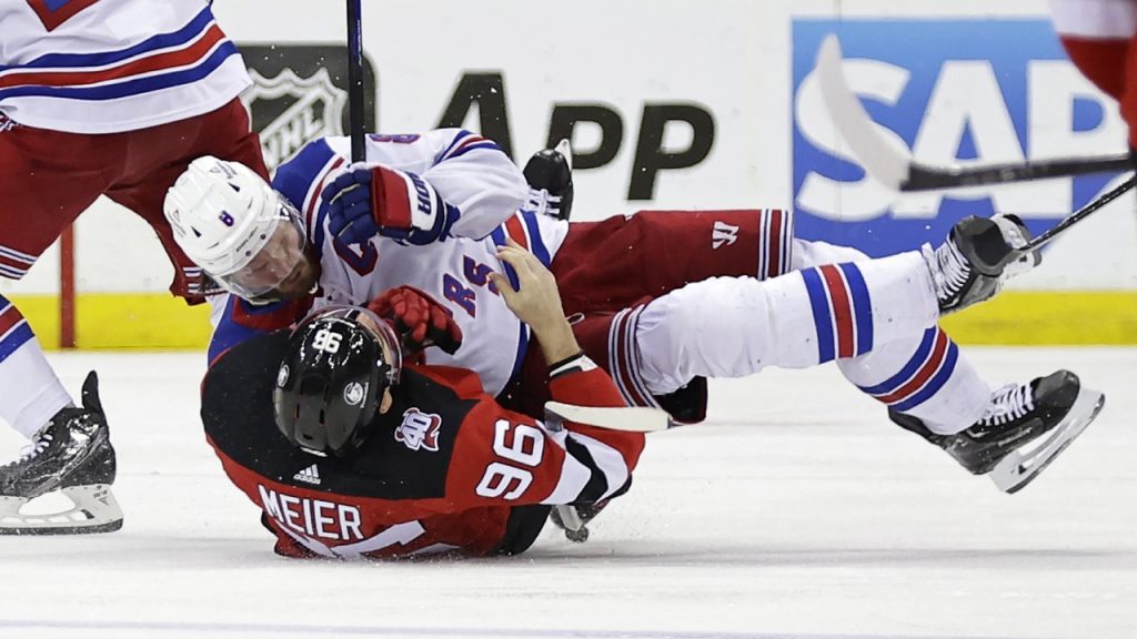 Rangers' Jacob Trouba throws enormous hit on Devils' Timo Meier