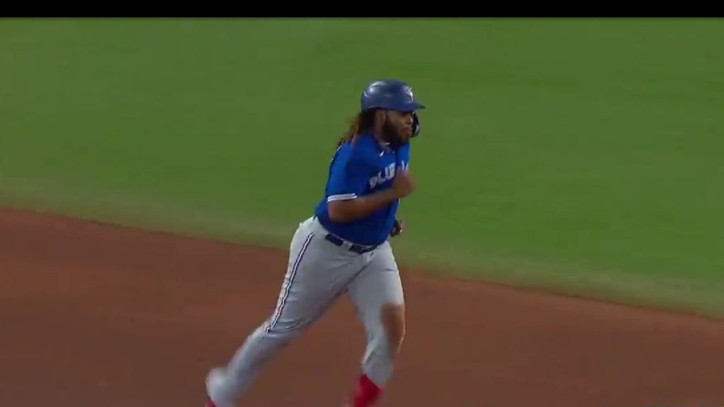 Vlad Guerrero Jr. strikes out against position player Luke Raley