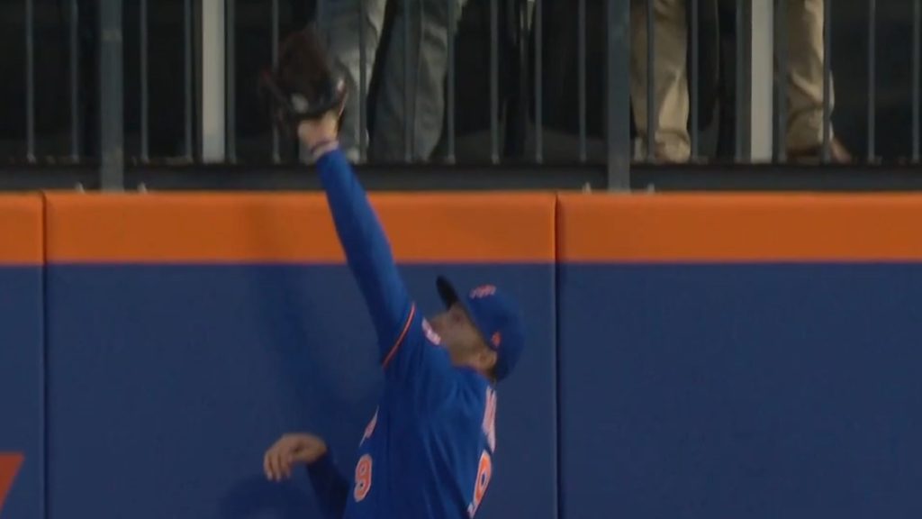 Brandon Nimmo laying out to make the catch. 
