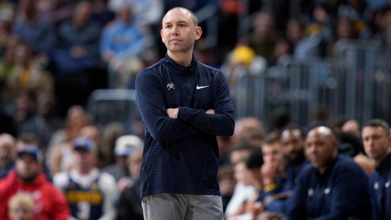 Denver Nuggets assistant coach David Adelman, filling in for coach Michael Malone, watches during the second half of the team's NBA basketball game against the Minnesota Timberwolves on Wednesday, Jan. 18, 2023, in Denver. (David Zalubowski/AP)