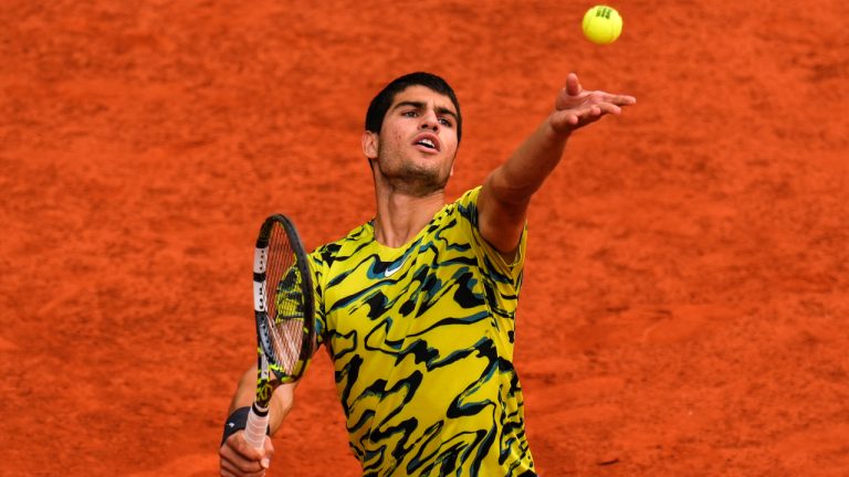 Carlos Alcaraz, of Spain, serves against Jan-Lennard Struff, of Germany, during their men's singles final match at the Madrid Open tennis tournament in Madrid, Spain, Sunday, May 7, 2023. (Manu Fernandez/AP)