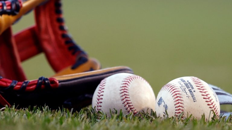 Baseballs and a glove before baseball game at Fenway Park between the Boston Red Sox and the Toronto Blue Jays, Monday, May 1, 2023, in Boston. (Michael Dwyer/AP)