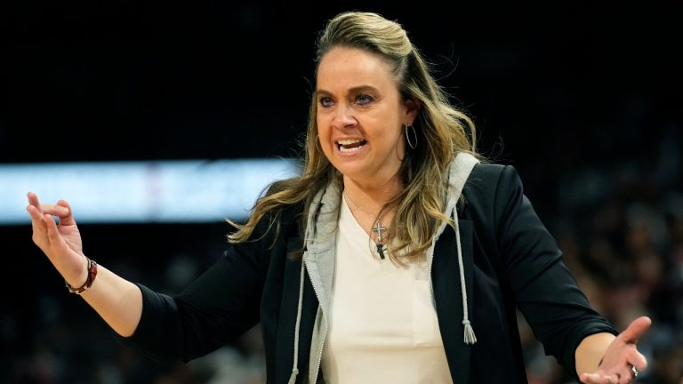 Las Vegas Aces head coach Becky Hammon motions towards the court during the first half in Game 2 of a WNBA basketball final playoff series against the Connecticut Sun, Tuesday, Sept. 13, 2022, in Las Vegas. (John Locher/AP)