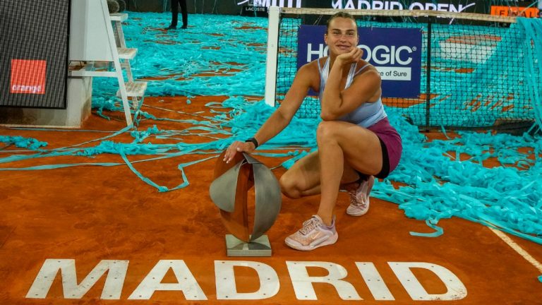 Belarus' Aryna Sabalenka holds the winner's trophy after defeating Iga Swiatek of Poland at the end of the women's final at the Madrid Open tennis tournament in Madrid, Spain, Saturday, May 6, 2023. (Manu Fernandez/AP)