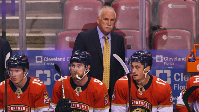 Former Florida Panthers head coach Joel Quenneville looks on from the bench during the first period of an NHL hockey game against the Colorado Avalanche, Tuesday, Oct. 21, 2021, in Sunrise, Fla. (AP)