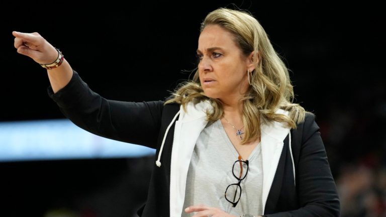 Las Vegas Aces head coach Becky Hammon motions towards the court during the first half of a WNBA basketball game against the Dallas Wings, Sunday, June 5, 2022, in Las Vegas. (John Locher/AP) 