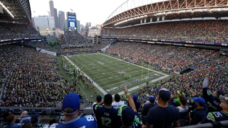 Fans cheer at Lumen Field during the second half of an NFL football game between the Seattle Seahawks and the Denver Broncos, Monday, Sept. 12, 2022, in Seattle. (John Froschauer/AP)