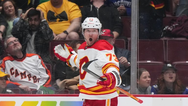 Calgary Flames' Tyler Toffoli celebrates after scoring the winning goal against the Vancouver Canucks during overtime NHL hockey action in Vancouver, on Friday, March 31, 2023. THE CANADIAN PRESS/Darryl Dyck