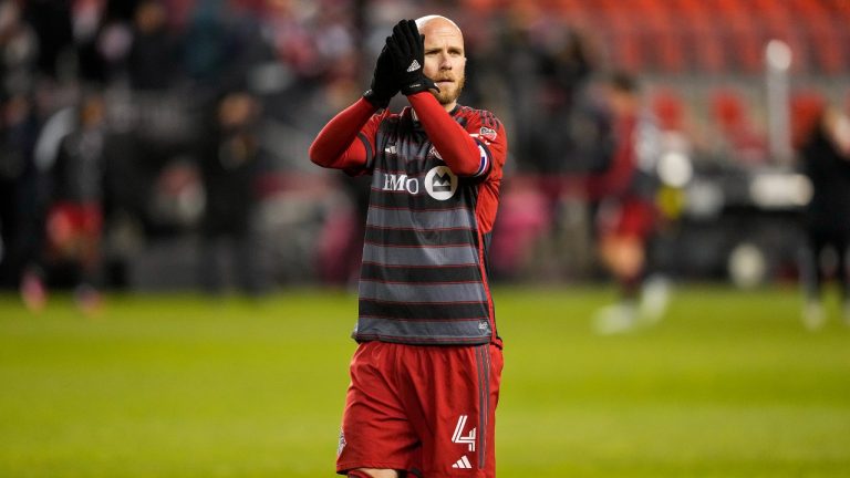 Toronto FC midfielder Michael Bradley (4) salutes the crowd after MLS soccer action against Charlotte FC in Toronto, on Saturday, April 1, 2023. THE CANADIAN PRESS/Andrew Lahodynskyj