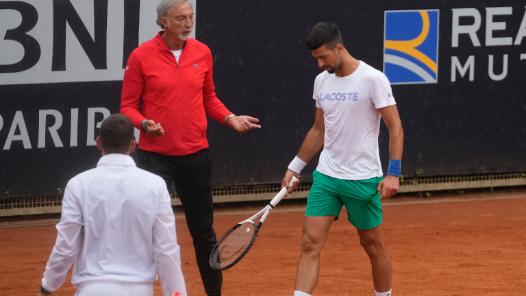 Serbia's Novak Djokovic, right, attends a training session at the Italian Open tennis tournament, in Rome, Wednesday, May 10, 2023. (AP Photo/Gregorio Borgia)