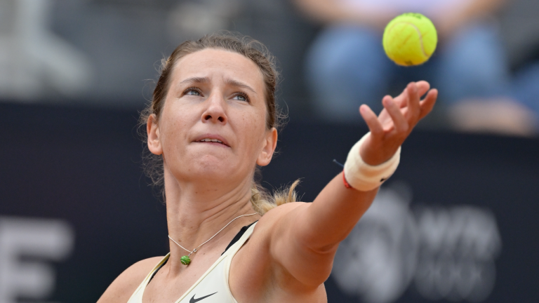 Belarus' Victoria Azarenka serves the ball to Sloane Stephens of the US during their match at the Italian Open tennis tournament in Rome, Italy, Thursday May 11, 2023.(LaPresse via AP)