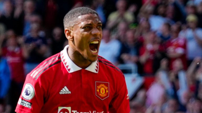 Manchester United's Anthony Martial celebrates after scoring his side's opening goal during the English Premier League soccer match between Manchester United and Wolverhampton at the Old Trafford stadium in Manchester, England, Saturday, May 13, 2023. (Jon Super/AP) 